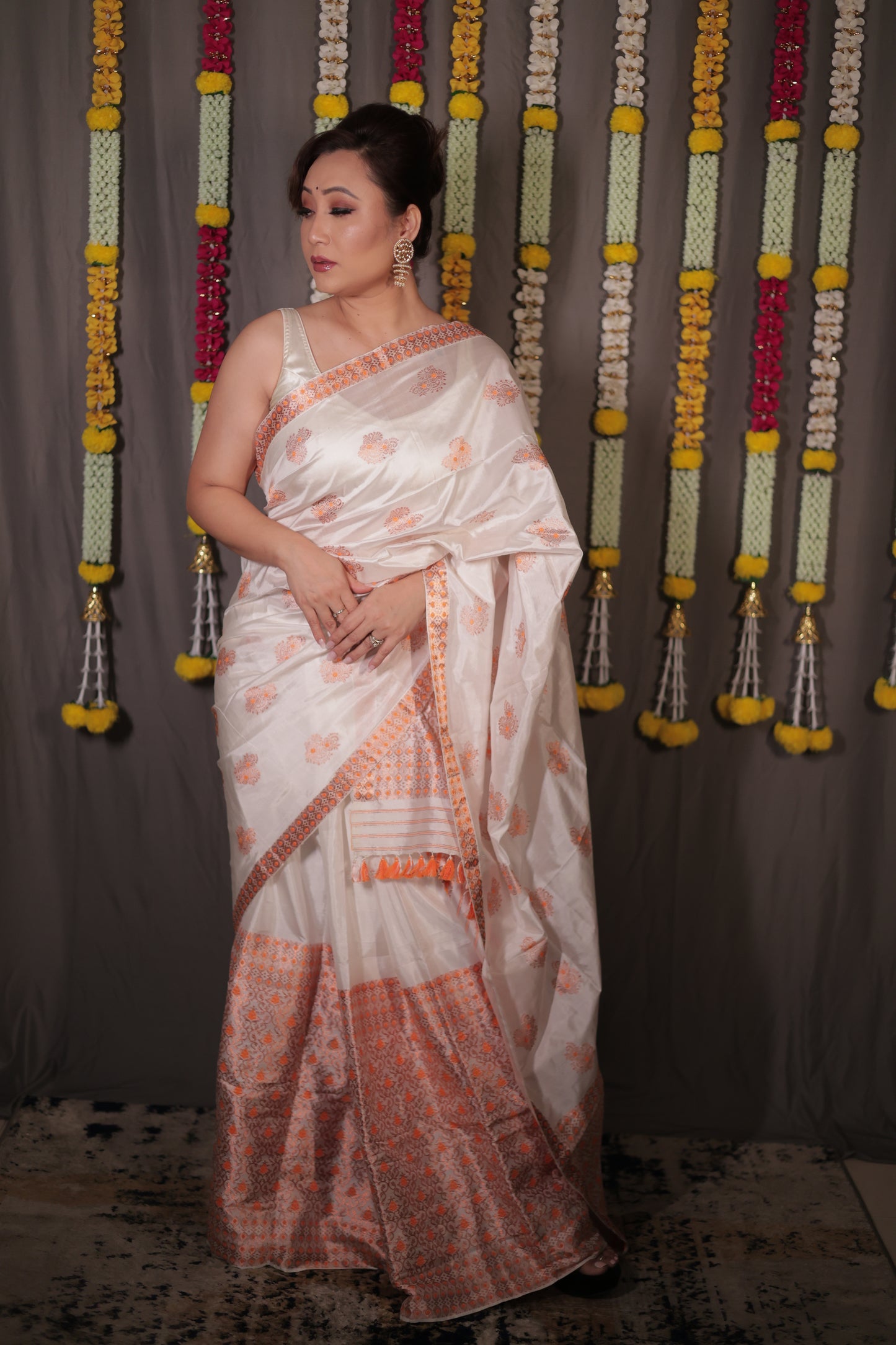 The "Gulabi" Handwoven Silk Mekhela Sador: A Blossom of Elegance