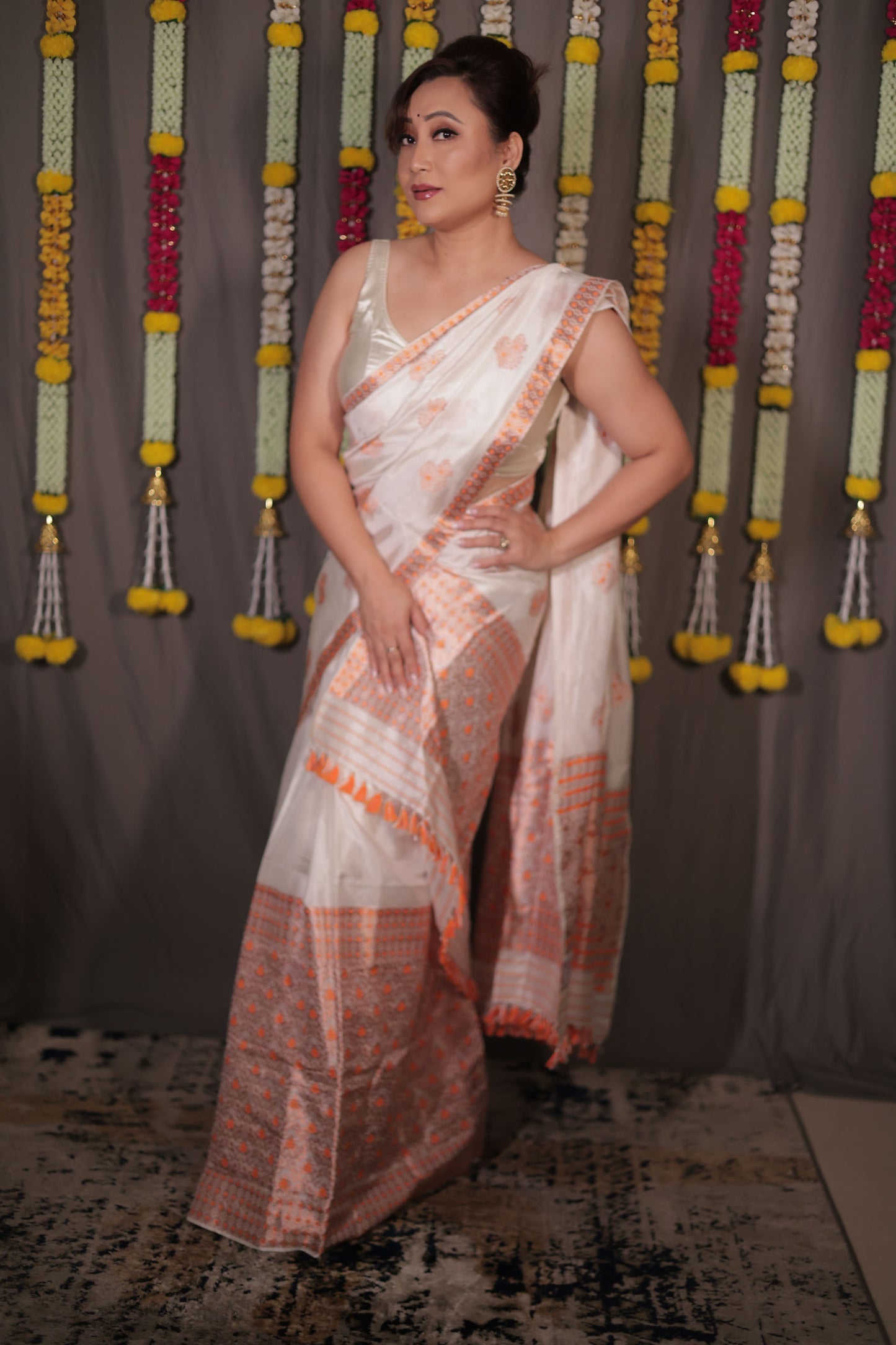 The "Rukmini" Handwoven Silk Mekhela Sador with Intricate Floral Motifs
