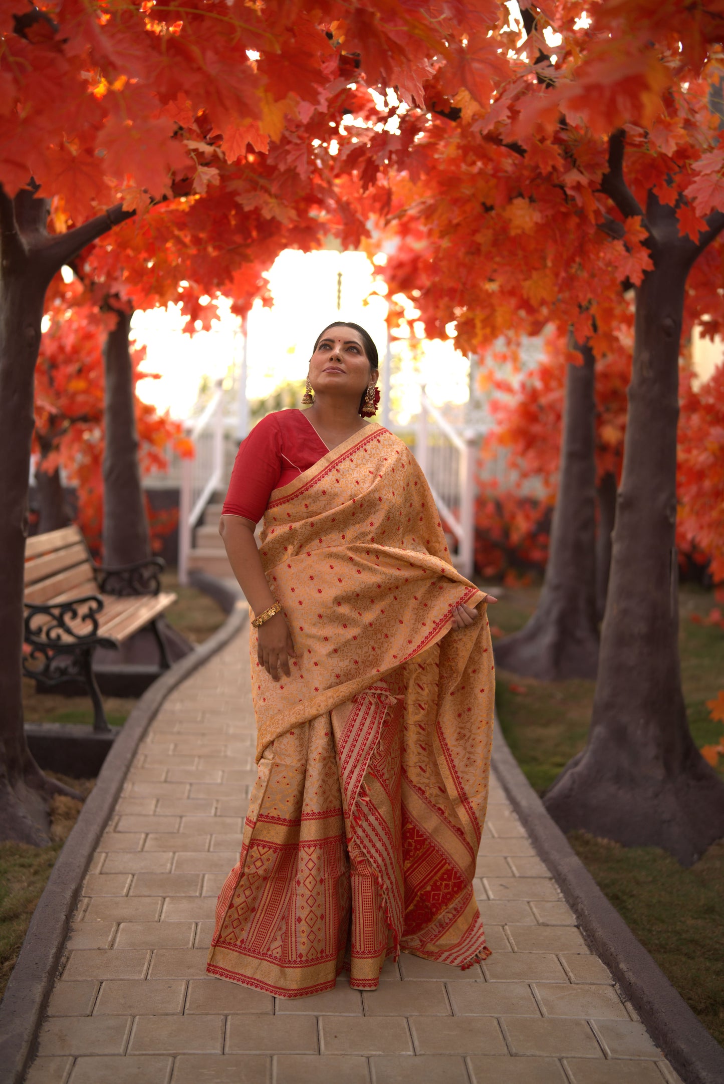 The "Swarna Raga" Handwoven Silk Mekhela Sador with Ruby Motifs & Golden Zari