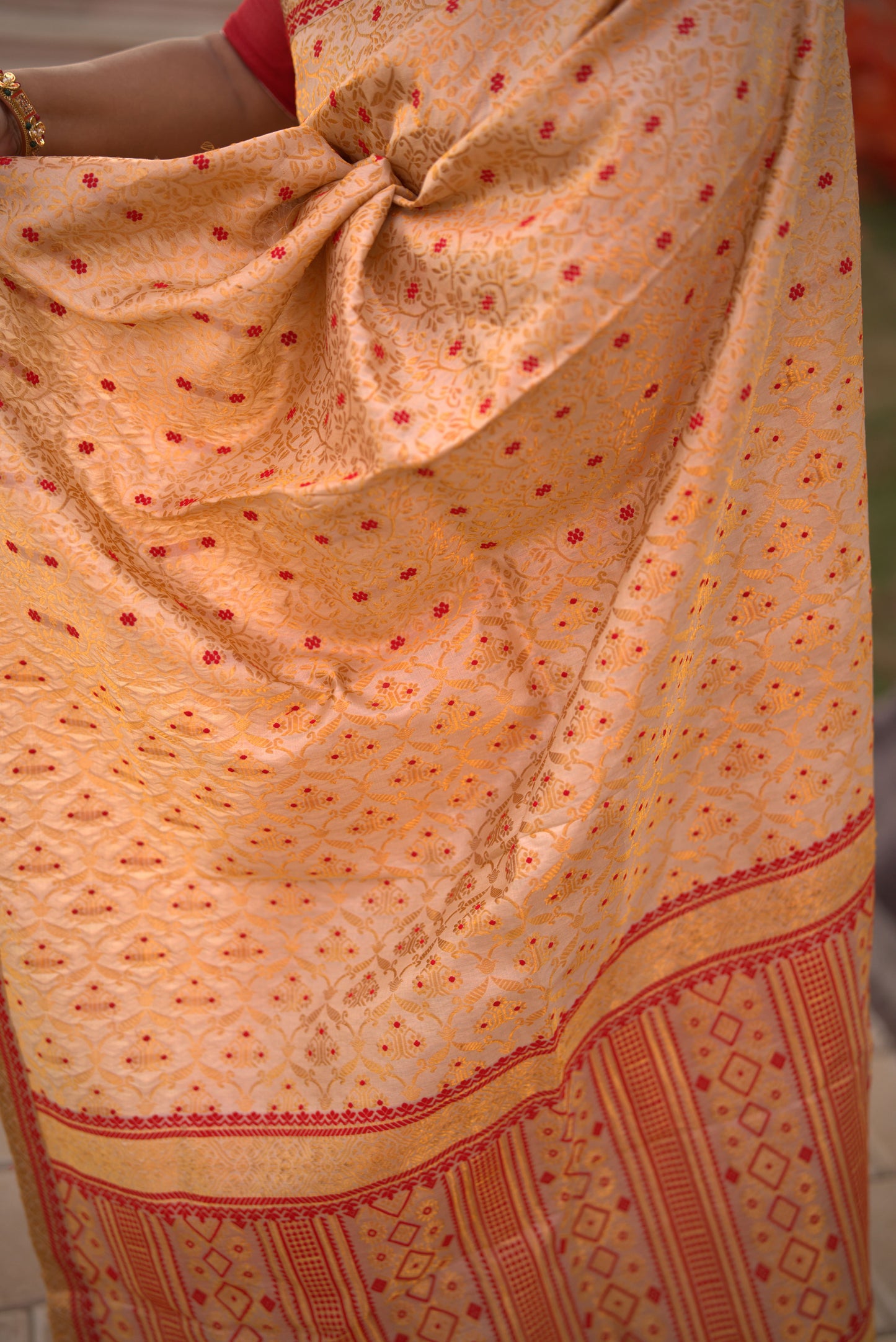 The "Swarna Raga" Handwoven Silk Mekhela Sador with Ruby Motifs & Golden Zari